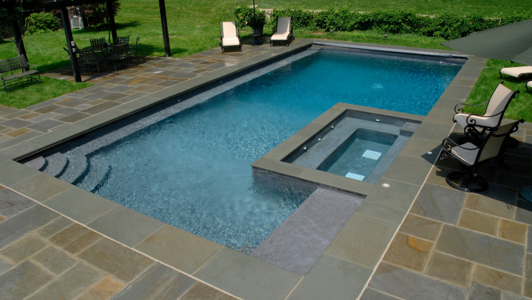 gunite pool with spa